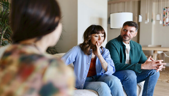 Family having serious talk at home