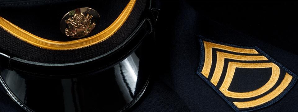 Military hat and insignia on coat