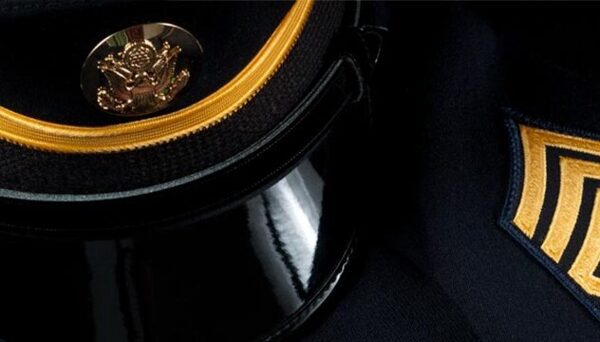 Military hat and insignia on coat